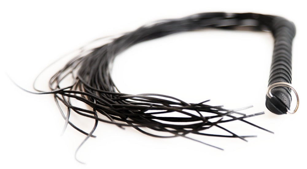 Lederen flogger ribfluweel